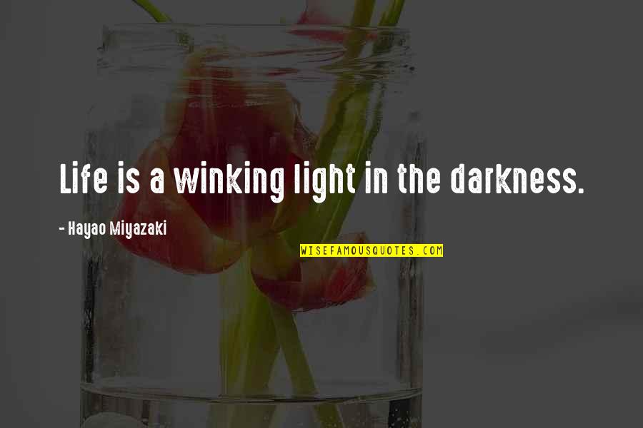 Ayishat Quotes By Hayao Miyazaki: Life is a winking light in the darkness.