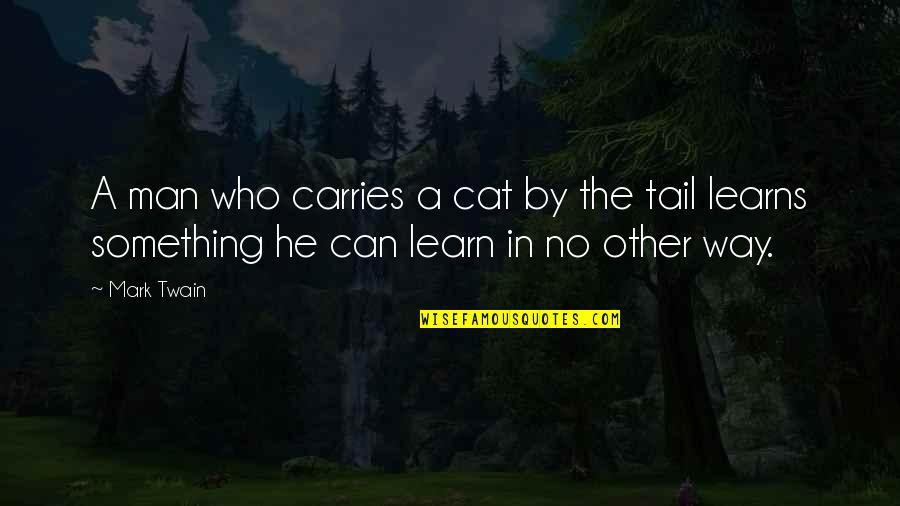 Chhatak Quotes By Mark Twain: A man who carries a cat by the