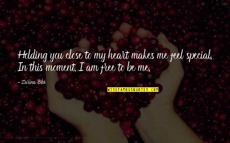 Close To You Quotes By Zarina Bibi: Holding you close to my heart makes me