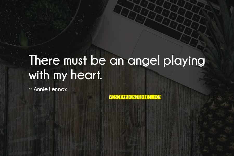 Credentialism Examples Quotes By Annie Lennox: There must be an angel playing with my