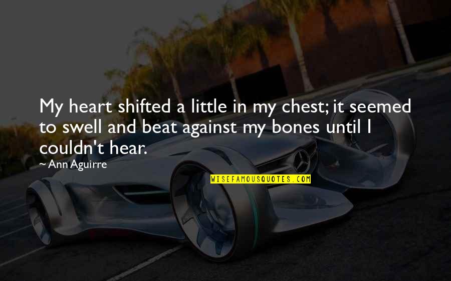 Heart Swell Quotes By Ann Aguirre: My heart shifted a little in my chest;