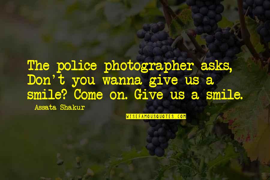 Heddesheimer See Quotes By Assata Shakur: The police photographer asks, Don't you wanna give