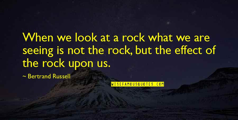 Medmerry Tide Quotes By Bertrand Russell: When we look at a rock what we