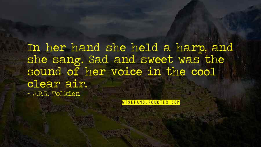 The Sound Of Your Voice Quotes By J.R.R. Tolkien: In her hand she held a harp, and