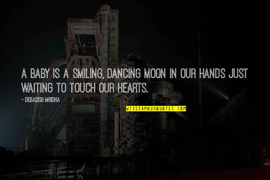 Touch Hearts Quotes By Debasish Mridha: A baby is a smiling, dancing moon in
