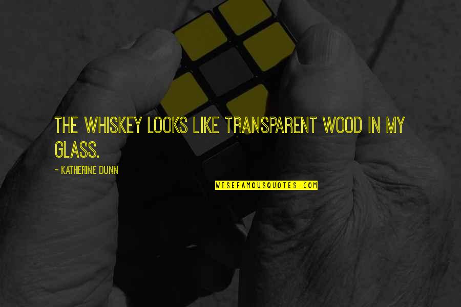 Transparent Quotes By Katherine Dunn: The whiskey looks like transparent wood in my