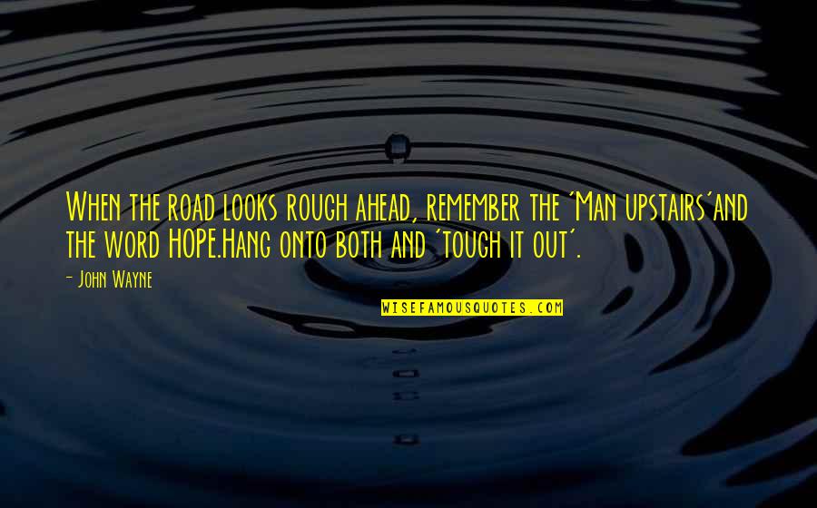 Yodok North Quotes By John Wayne: When the road looks rough ahead, remember the